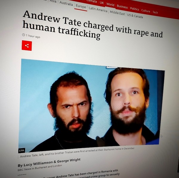 Andrew Tate charged with rape and human trafficking